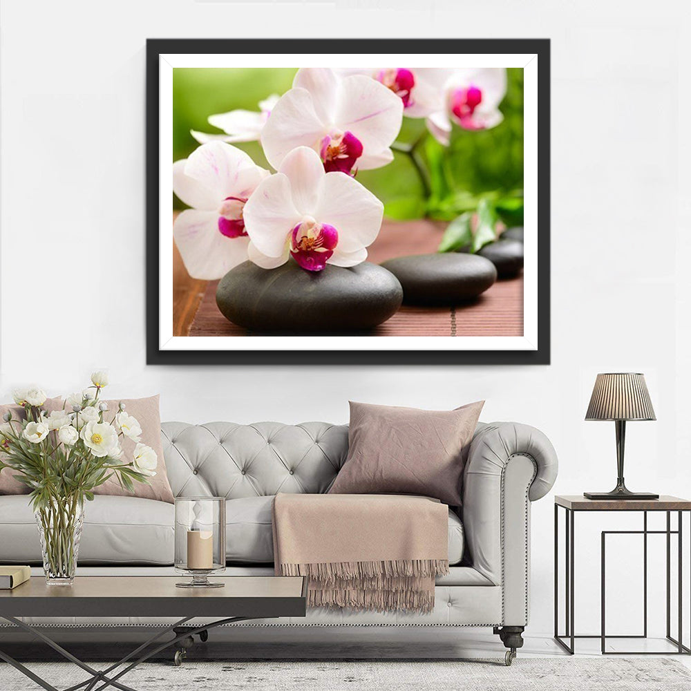 White flowers and black stones diamond painting